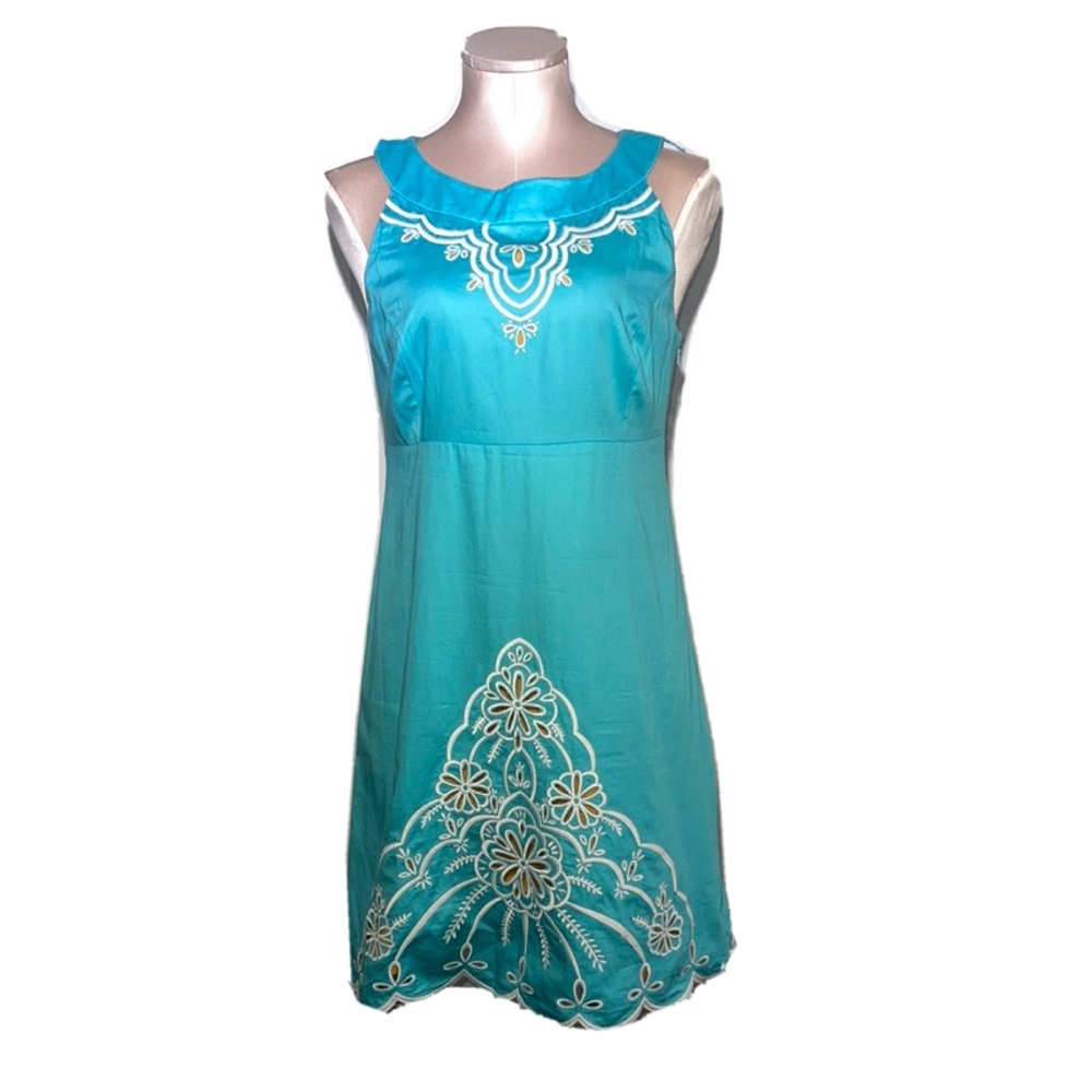 Lilly Pulitzer aqua dress with white stitching. Yellow underneath. Size 4